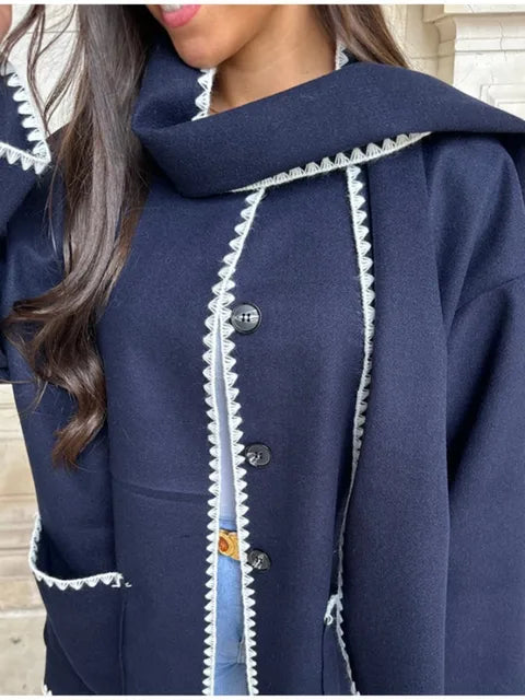 Elegant and versatile jacket with integrated scarf 